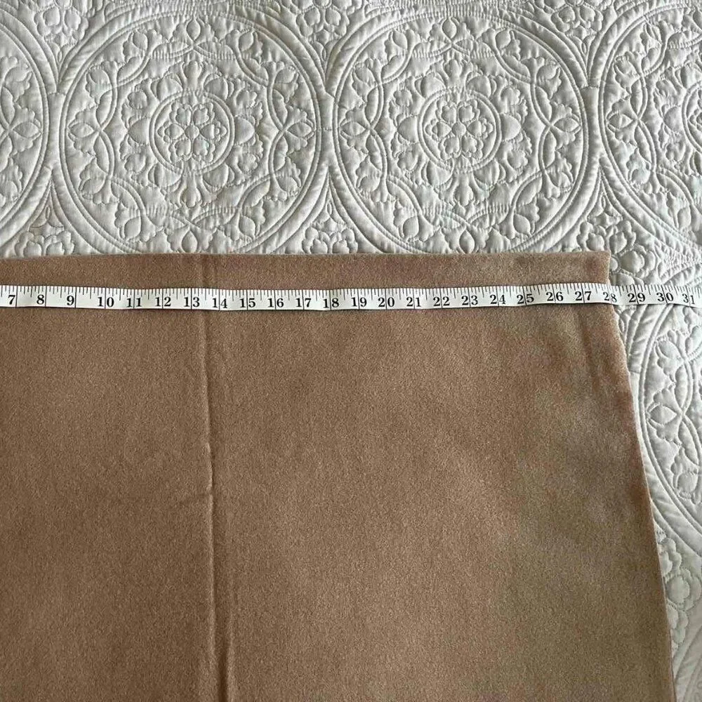 Brown Soft warm scarf is a mixture of polyester and viscose condition is new